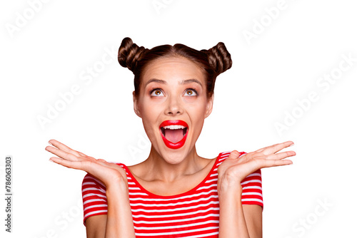 So excited and positive girl isolated on red background loud laughs raising her head and hands up. Concept of advertising, sale and discount isolated on red background photo