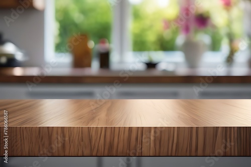 A blurred contemporary kitchen interior with light wood cabinets and a counter