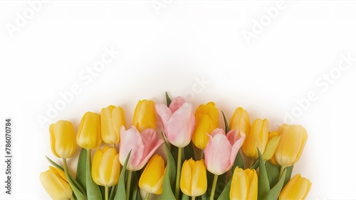 Big bouquet of yellow with pink tulips on white background