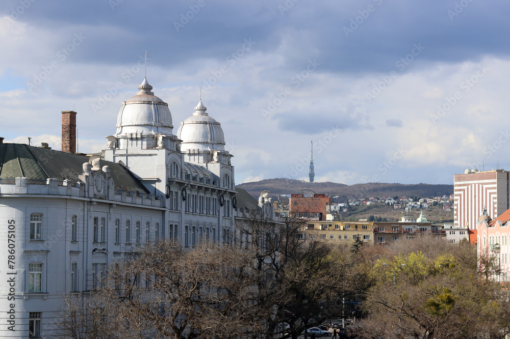 Architecture of Bratislava, Slovakia. View on old town from Danube river. Cloudy spring day. Panoramic photo of beautiful old buildings. Tourist destinations concept. 