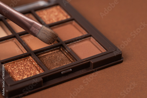 Natural colored eye shadow makeup palette with brush. Woman cosmetic and beauty product, eige color eyeshade pattern