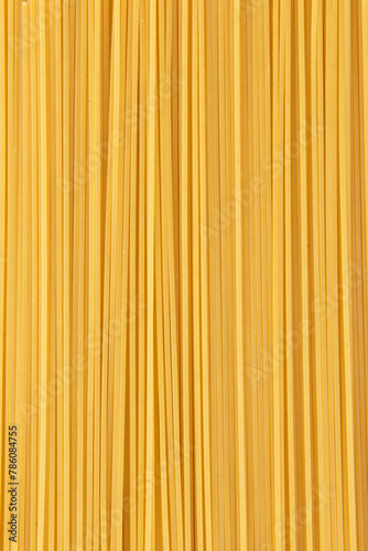 Raw dry spaghetti italian pasta texture background.