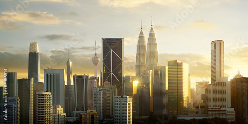 Serene view of a Kuala Lumpur city skyline bathed in the warm glow of sunset