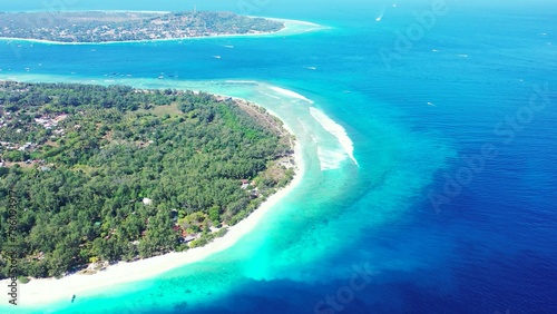 Beautiful view of an island with a calm sea on a summer sunny day