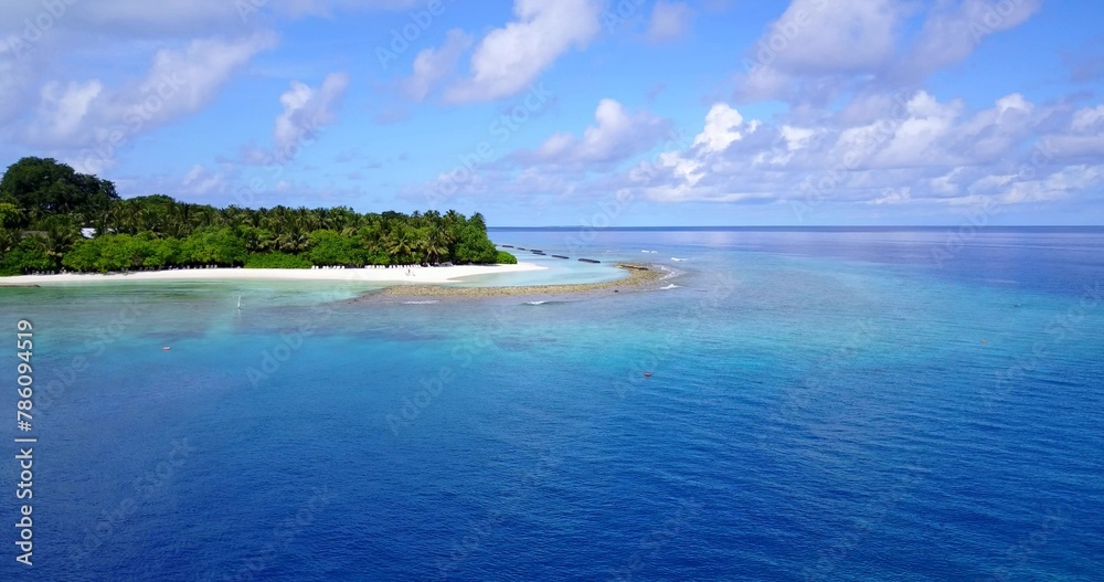 Beautiful view of an island with a calm sea on a summer sunny day