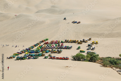 oasis and desert sand dunes photo