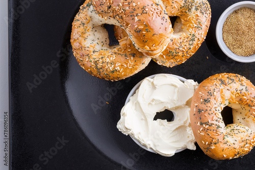 Everything bagels with seeds served with cream cheese