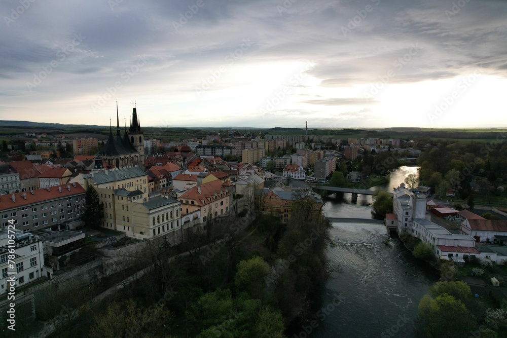 Bird's eye view of Louny city on a bank of a river in Czech Republic on a cloudy day