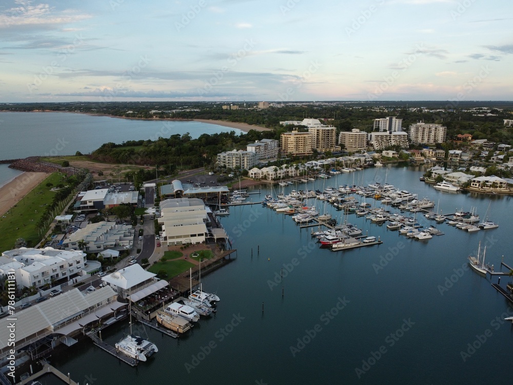 Aerial view of cityscape Florida surrounded by water during sunset