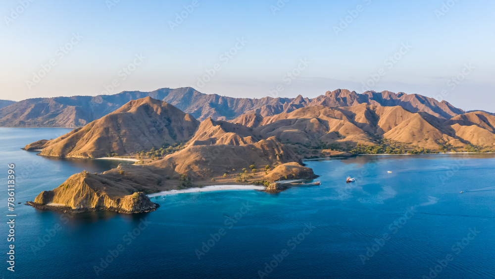 Aerial view of beautiful sunset at Pink beach, Flores Island, Indonesia.