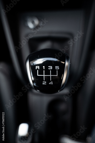 Slika na platnu Gear stick knob with leather closeup from top view