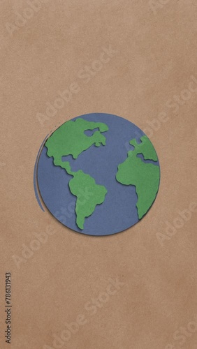 Animated Paper Texture Earth On Brown Paper Vertical