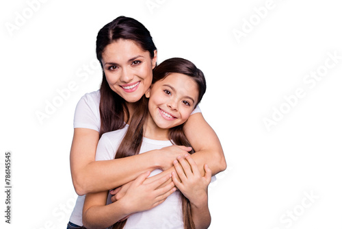 Close up photo amazing pretty two people brown haired mum mom small little daughter stand hugging piggy back lovely free time rejoice wearing white t-shirts isolated on bright blue background photo
