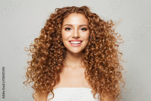 Attractive model woman with natural make-up, healthy skin and long hair. Female beauty, cosmetology and skincare concept