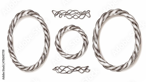 Isolated silver ropes and frame of twisted twines. Modern realistic set of 3D metal satin cords in the shape of ovals, swirls, loops and wavy lines. photo