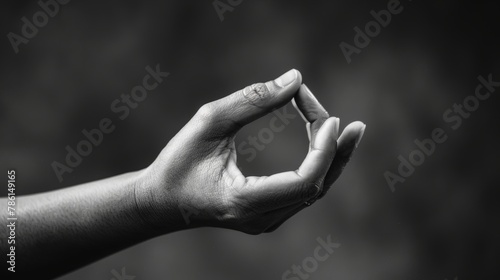 Black and white photograph of a Brahma mudra. Yogic hand gesture. photo