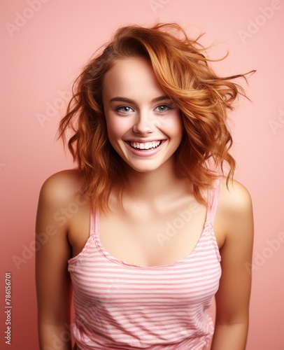 Portrait of caucasian girl, wearing a casual clothing and smiling on studio color background