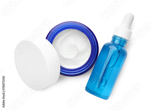 Jar and bottle of cosmetic products isolated on white, top view