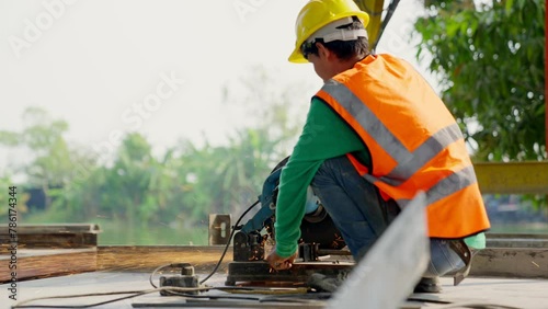 Heavy industrial engineering factory interior with industrial workers using angle grinders and metal pipe cutters, metal structures. construction worker, Foreign workers. Contractor concept.