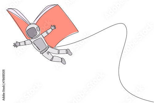 Single continuous line drawing young astronaut flying with wings that come from open big book. The metaphor carried away with the storyline. Constructive fantasy. One line design vector illustration