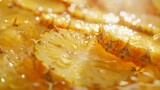 Pineapple slices with water drops on a golden background. Close-up.