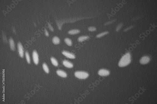 Texture de mur en béton avec des ombres ovales en noir et blanc pour fond et arrière-plan