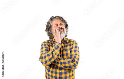 A man with a beard and a checkered shirt complains of a toothache