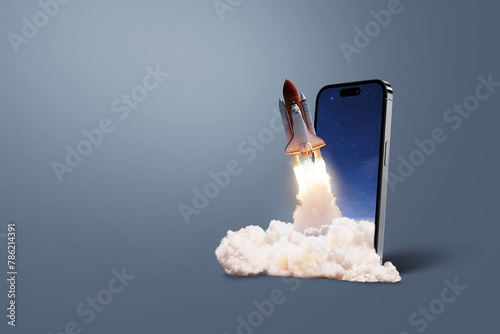 Smartphone with a rocket taking off with smoke and blast on a dark background, concept. Start up and launch, creative idea. Application and promotion. Marketing. Space shuttle lift off. Optimization