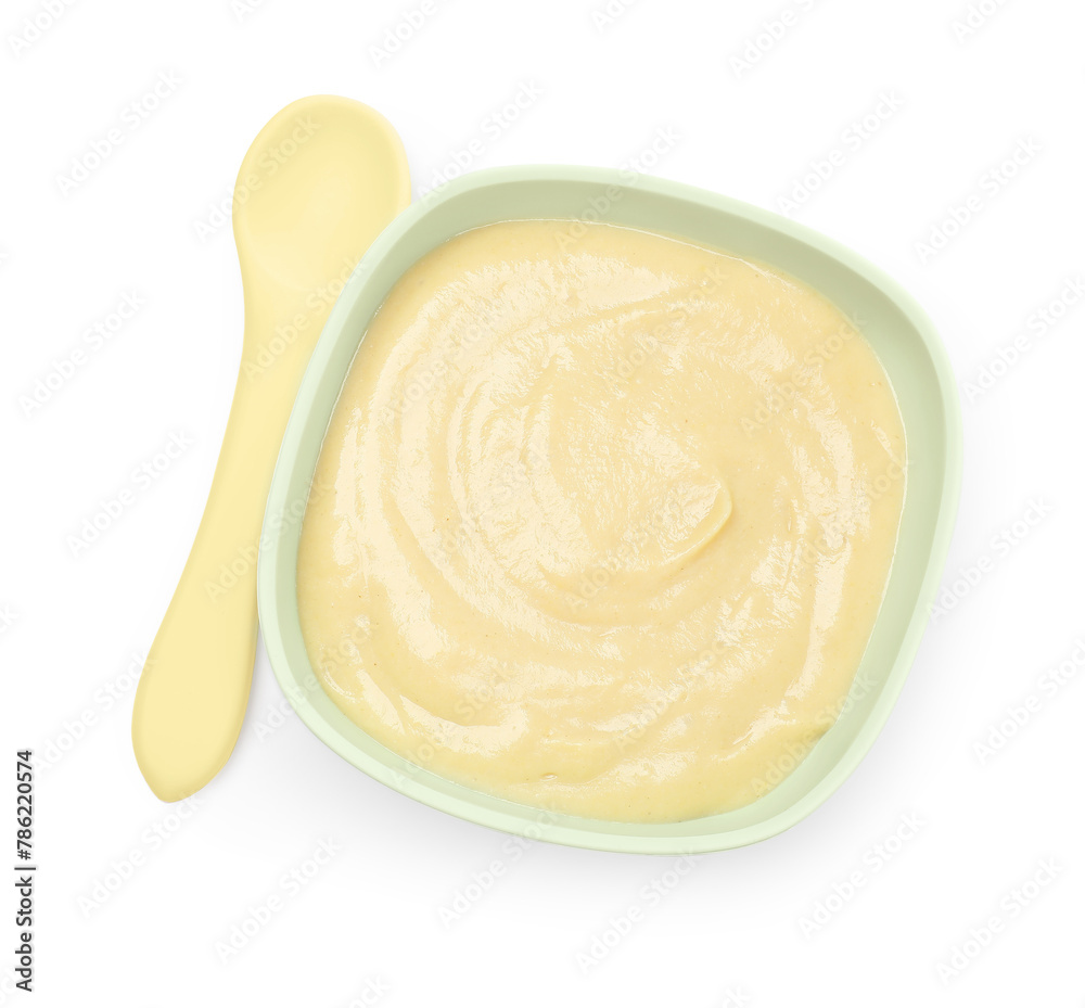 Tasty baby food in bowl and spoon isolated on white, top view Tasty baby food in bowl and spoon isolated on white, top view