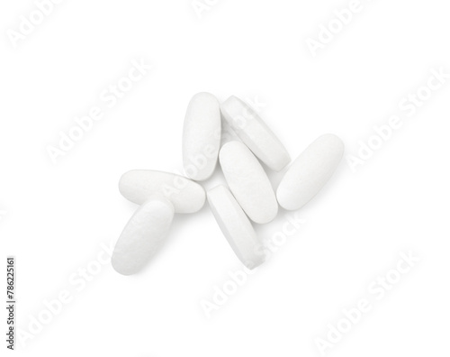 Vitamin pills isolated on white  top view. Health supplement