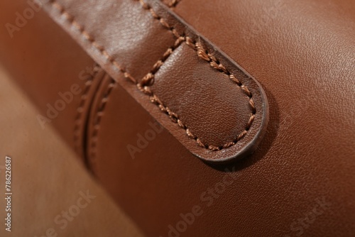 Texture of brown leather as background, closeup