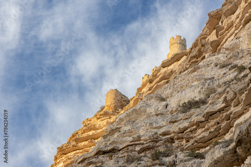 Natural walk next to the júcar river, popular cave houses, carved into the mountain,  region of La Manchuela, in Alcalá del Júcar (Albacete, Spain). photo