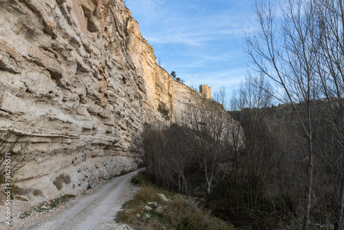 Alcalá del Júcar castle is located on a rock formed by the gorge of the Júcar River, from where the entire town can be seen, in the province of Albacete, La Manchuela, Castila la Mancha, Spain photo
