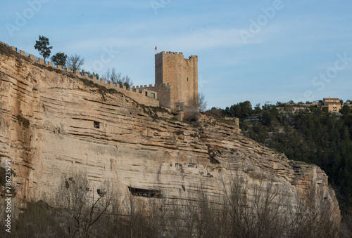 Alcalá del Júcar castle is located on a rock formed by the gorge of the Júcar River, from where the entire town can be seen, in the province of Albacete, La Manchuela, Castila la Mancha, Spain photo