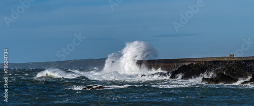 crashing wvaes at Holyhead Breakwater Anglesey photo