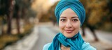 Diverse middle eastern woman in tracksuit and turban promoting healthy lifestyle