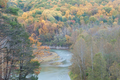 Genesee river flowing through the valley in autumn 