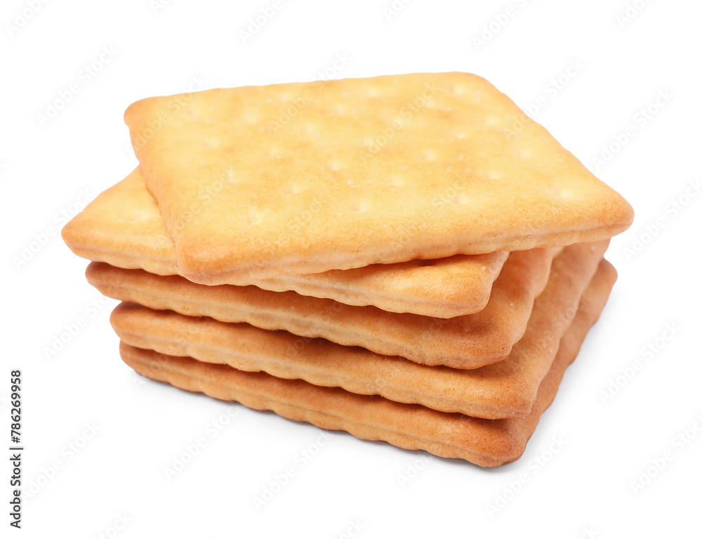 Tasty crispy square crackers isolated on white Tasty crispy square crackers isolated on white