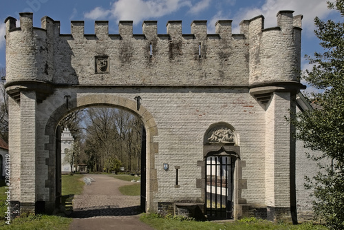 Forrtified entrance gate to Drongengoedhoever, medieval farm in Drongengoedbos nature reserve, Ursel, Flanders, Belgium  photo