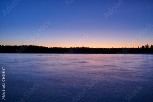 sunset on the lake in winter