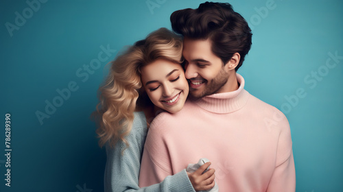 Couple Embracing in a Colorful Setting with Soft Lighting, Focused on the Subjects' Happy Expression and Outfits.