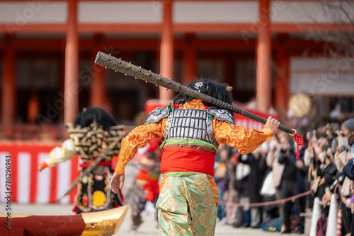 Kyoto, Japan - February 3 2024 : Heian Jingu Shrine Setsubun festival. Performers wearing an oni ( demon or ogre ) costume in the traditional Japanese shinto ritual ceremony. photo