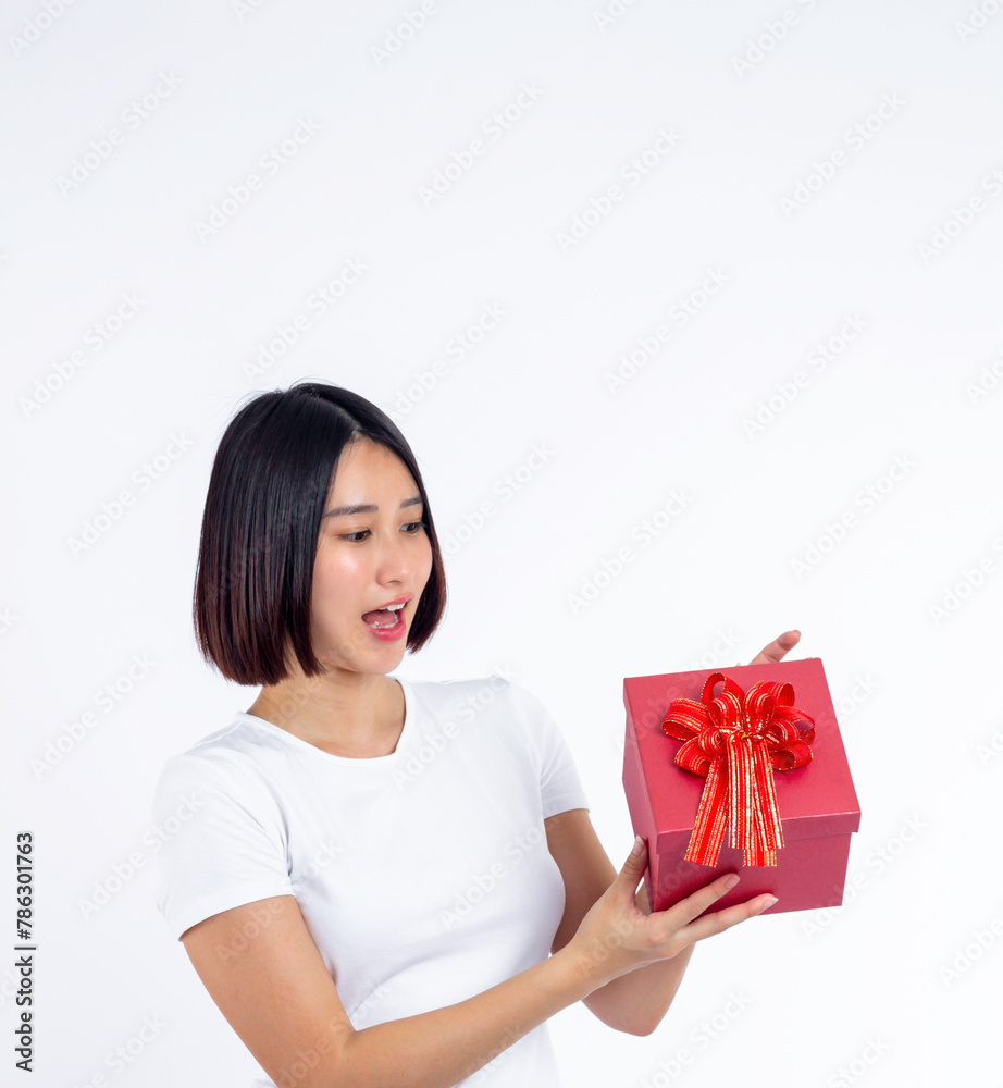 Young woman asian with gift present box on isolated studio white background, gifting for lady birthday,Shopping and sale,celebration,vintage party and overjoyed emotions, portrait young woman concept. Young woman asian with gift present box on isolated studio white background, gifting for lady birthday,Shopping and sale,celebration,vintage party and overjoyed emotions, portrait young woman concept.