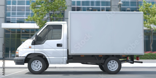 White delivery truck van on road with building background.