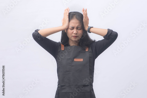 Young Asian Woman Barista Wearing Apron