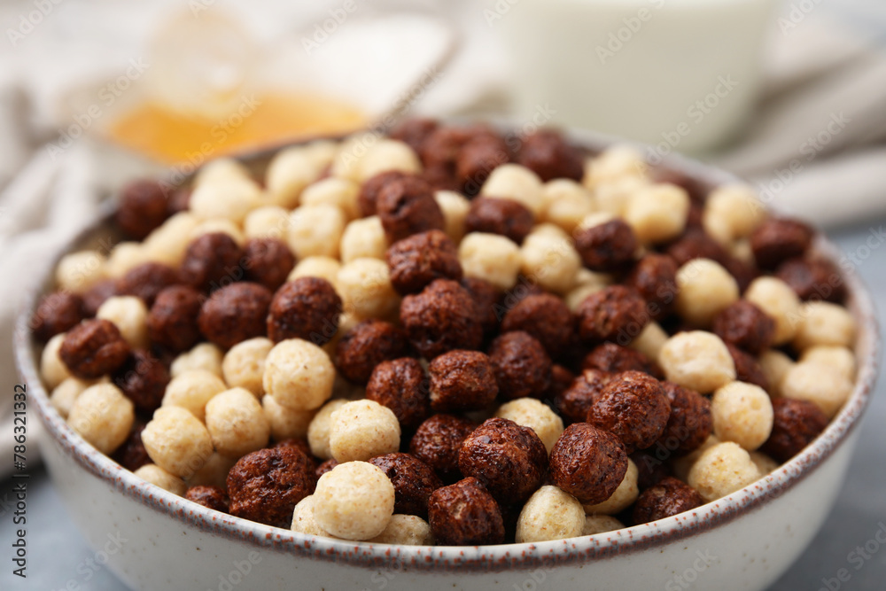 Tasty cereal balls in bowl on table, closeup Tasty cereal balls in bowl on table, closeup