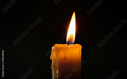 one burning candle with dripping wax close-up