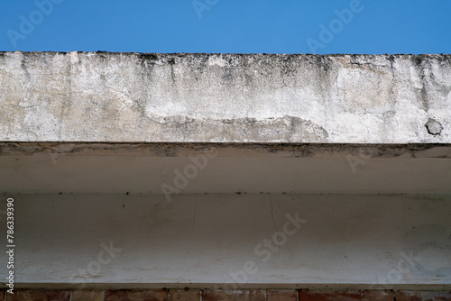 cornice facade of the building with infiltration and erosion of the plaster. the problems of disintegration and degradation of reinforced concrete are widespread in many buildings. facade bonuses