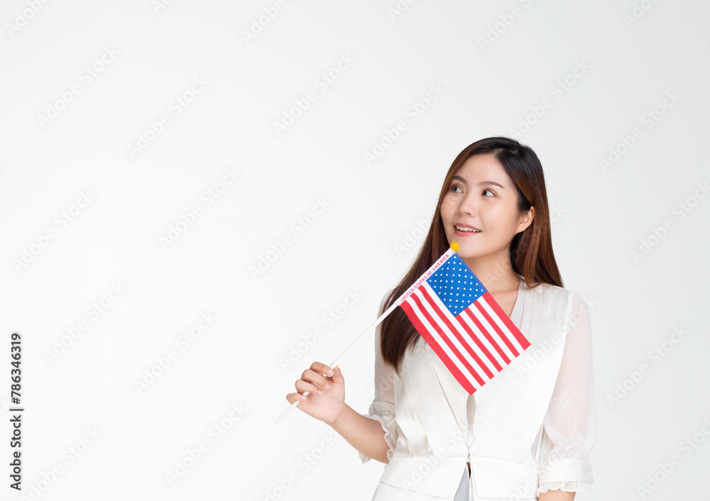 Young woman asian smiling confident holding united states flag over isolated white background, portrait young woman concept. Young woman asian smiling confident holding united states flag over isolated white background, portrait young woman concept.