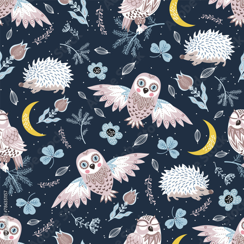 Seamless pattern with owls, crescents and floral elements.